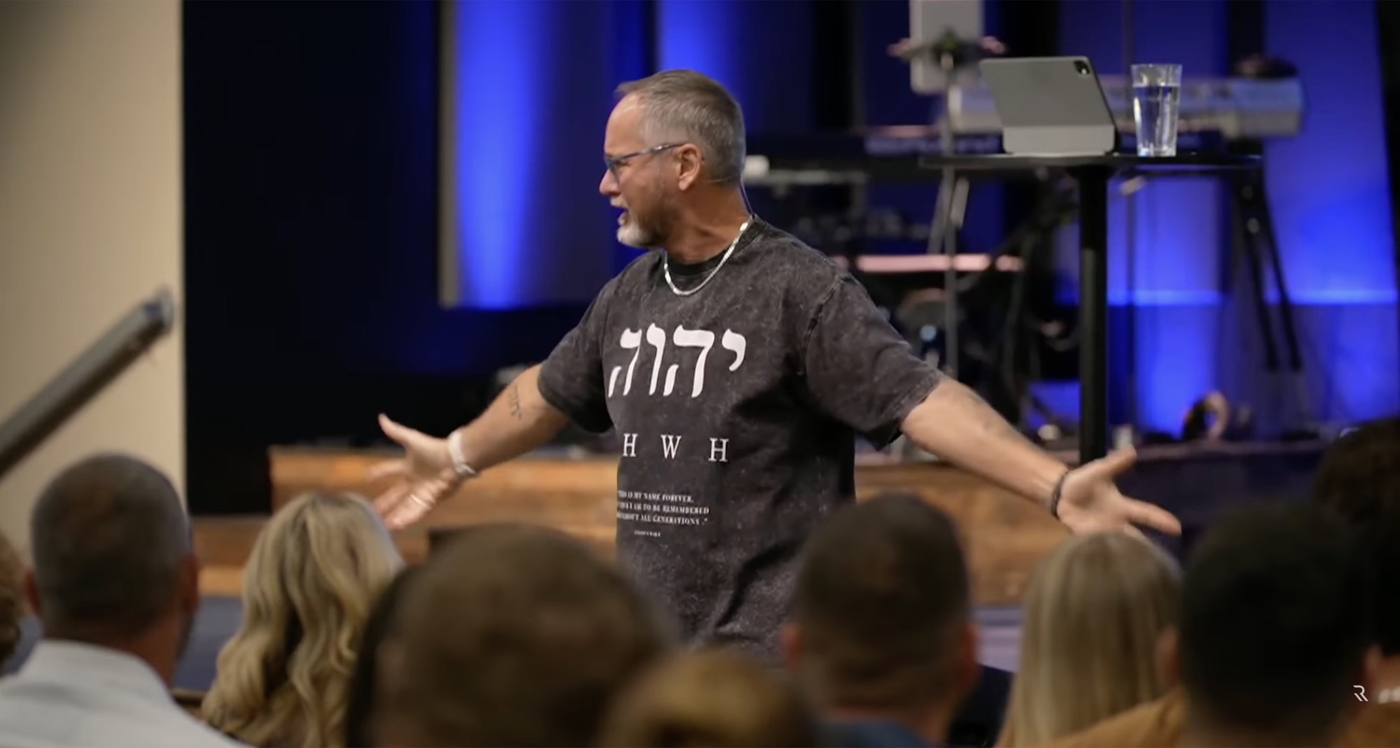 Pastor Steve Parker teaching the congregation in The Living Room